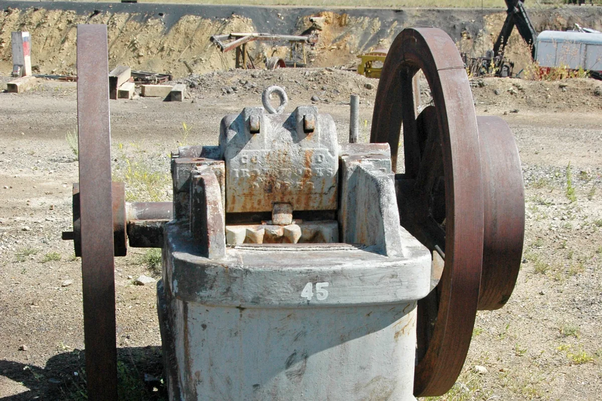Jaw rock crusher with twin flywheels at the Orphan Girl Mine, the kind of crushing machine an MGM 112 Type 62, 63 or 64 armoured cable powers
