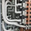 Heat-resistant single-core wiring behind breakers in a main switchboard