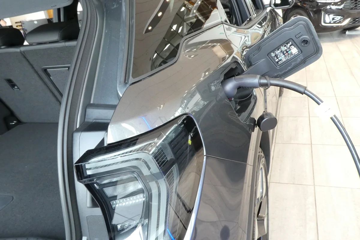 Type 2 charging connector and cable plugged into the charging socket of an electric car, the use an H07BZ5-F charging cable is built for