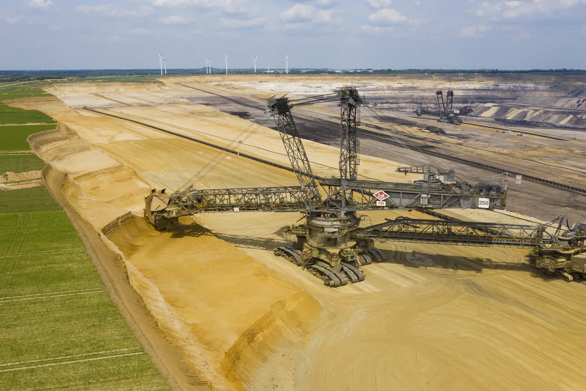 Bucket-wheel excavators in an open-cast lignite mine, electrically driven mining machines supplied through medium-voltage cables such as NTMCGCWOEU