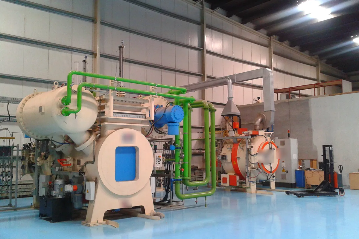 Computer-controlled heat-treatment furnaces in an industrial plant, the kind of hot equipment whose internal wiring uses 250 °C UL 1570 PTFE wire
